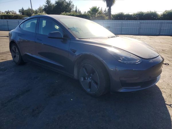 2023 TESLA MODEL 3 — Passenger 3/4