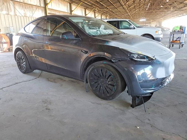 2024 TESLA MODEL Y — Passenger 3/4