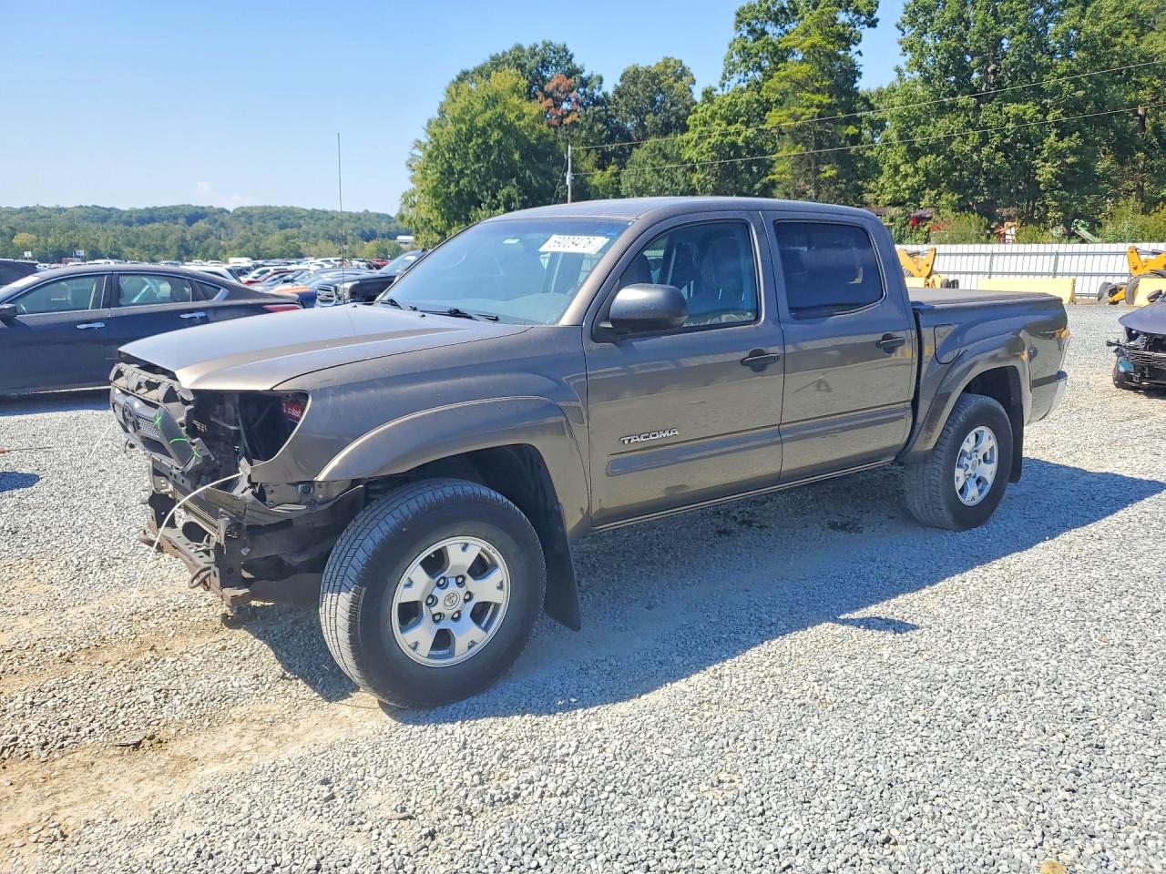 2013 TOYOTA TACOMA Delux — Front 3/4