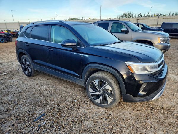 2024 VOLKSWAGEN TAOS 4Motion SEL — Passenger 3/4
