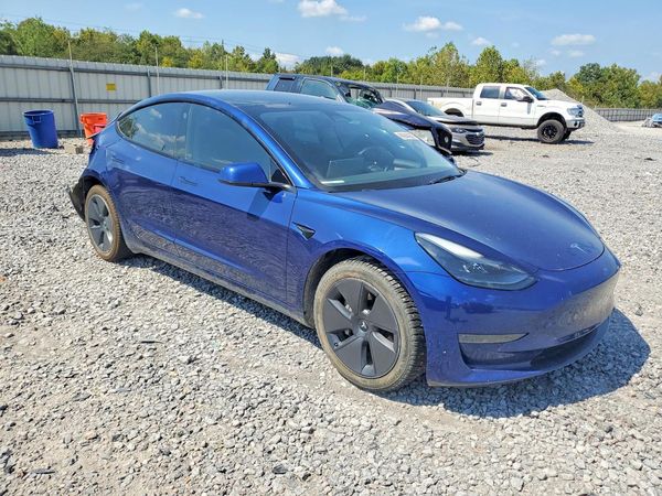 2023 TESLA MODEL 3 — Passenger 3/4
