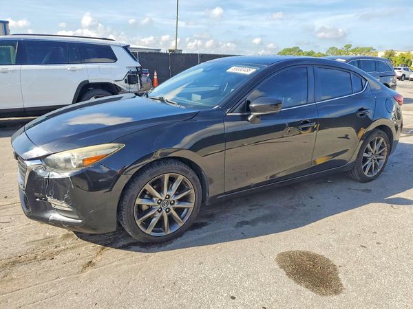 2018 MAZDA 3 Touring — Front 3/4