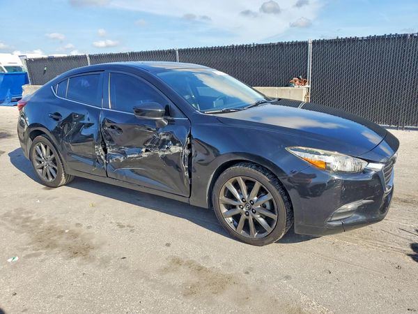 2018 MAZDA 3 Touring — Passenger 3/4