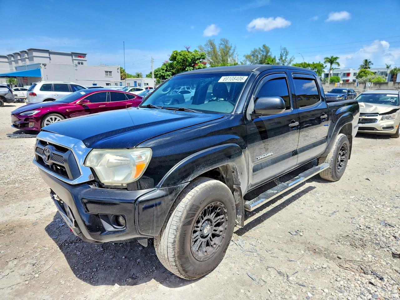 2013 TOYOTA TACOMA Delux — Front 3/4
