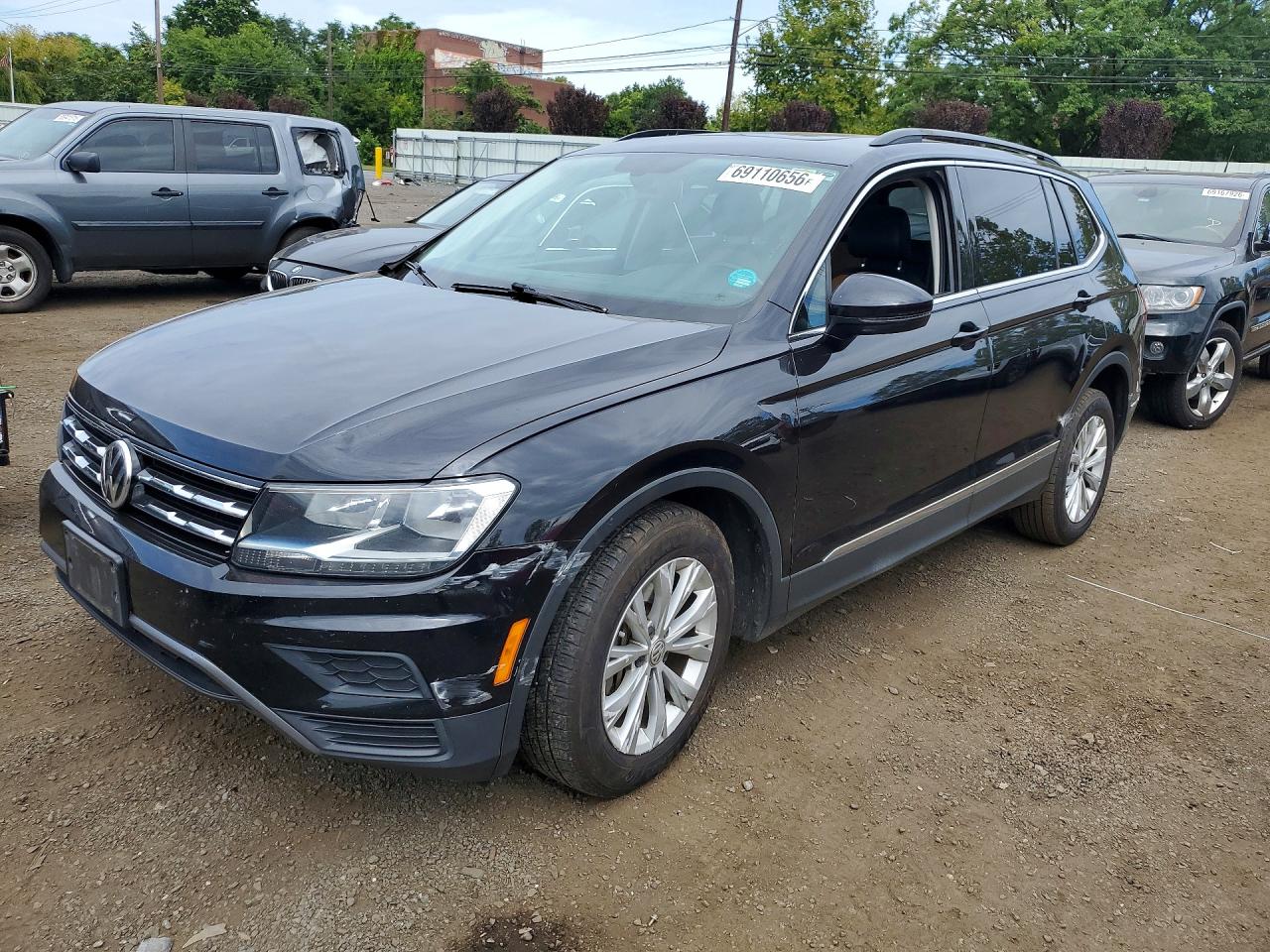 2018 VOLKSWAGEN TIGUAN SE, 4Motion SEL — Front 3/4