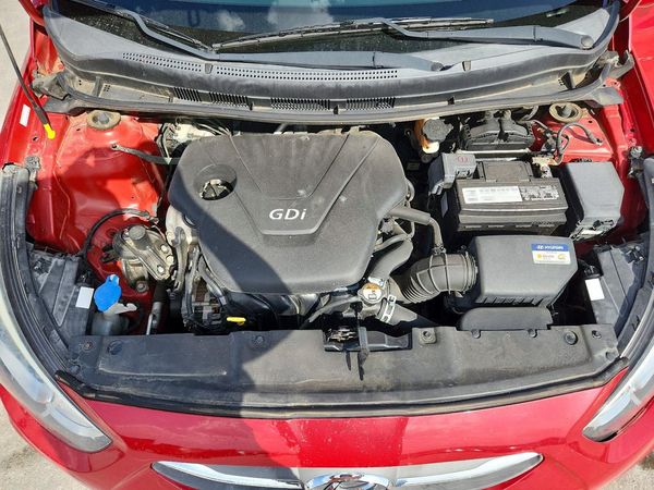 2015 HYUNDAI ACCENT — DENT