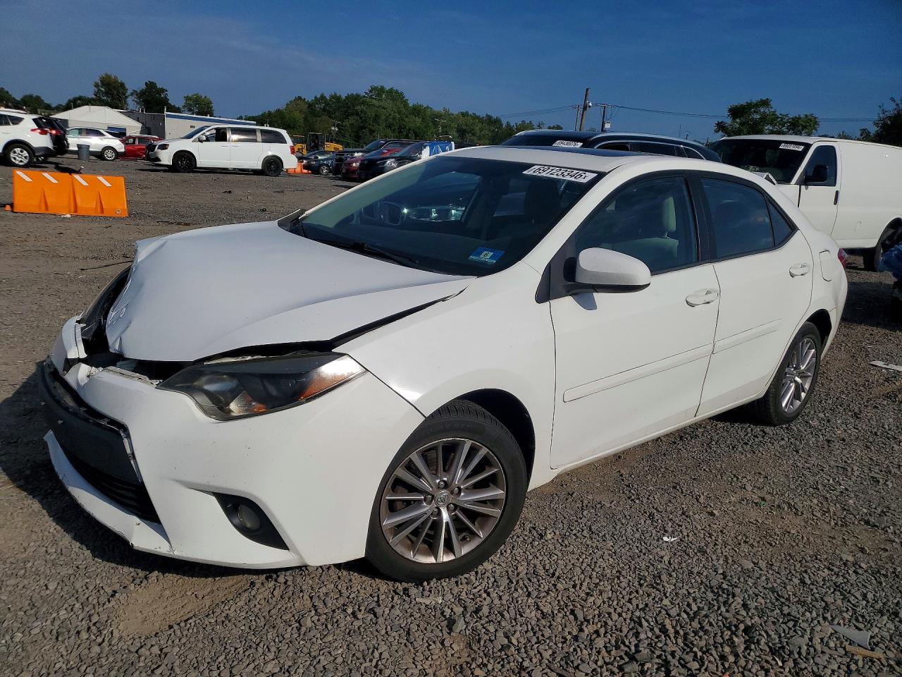 2014 TOYOTA COROLLA L/LE — Front 3/4