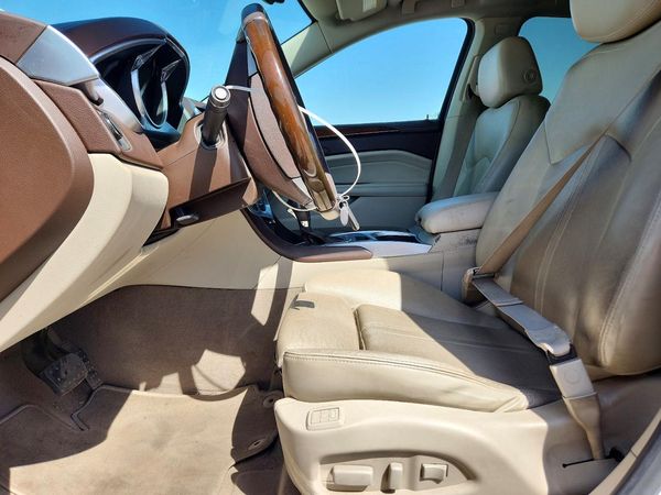 2012 CADILLAC SRX — DENT