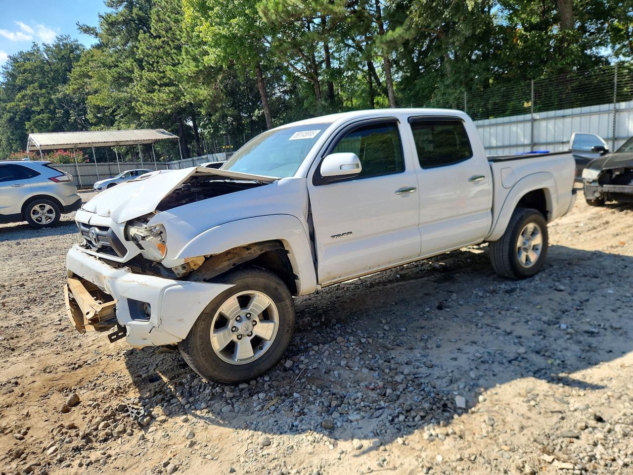 2013 TOYOTA TACOMA Delux — Front 3/4