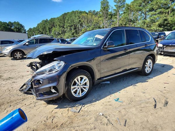 2014 BMW X5 xDrive35d — Front 3/4