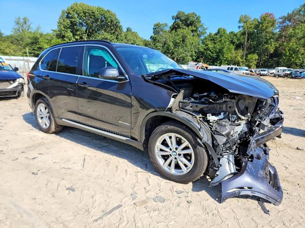 2014 BMW X5 xDrive35d — Passenger 3/4
