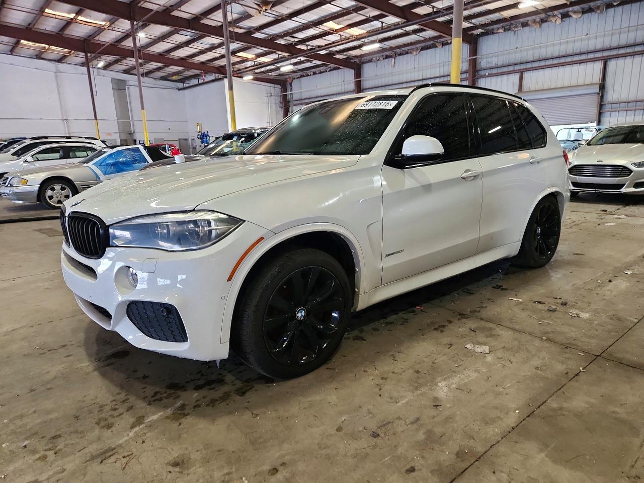 2016 BMW X5 xDrive50i — Front 3/4