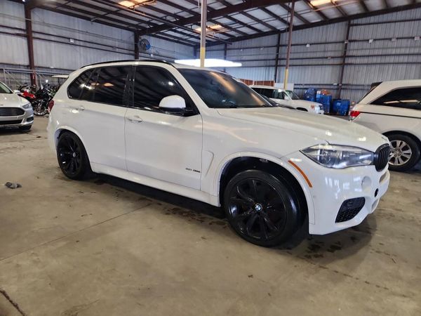 2016 BMW X5 xDrive50i — Passenger 3/4