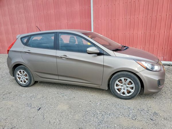 2014 HYUNDAI ACCENT 5DR GS / 4DR GLS — Passenger 3/4