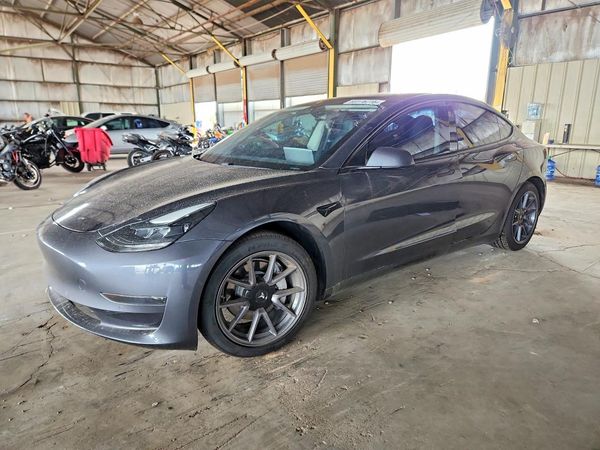 2021 TESLA MODEL 3 — Front 3/4