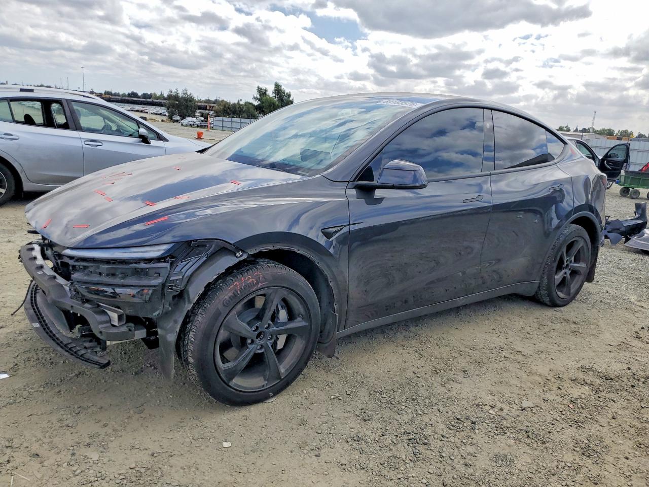 2026 TESLA MODEL Y — Front 3/4