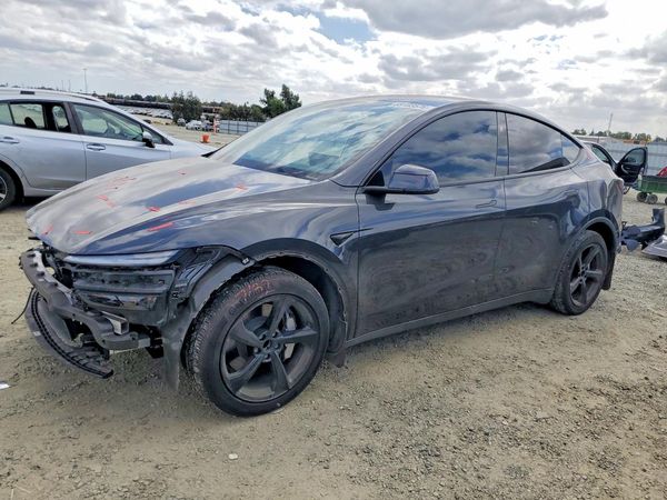 2026 TESLA MODEL Y — Front 3/4