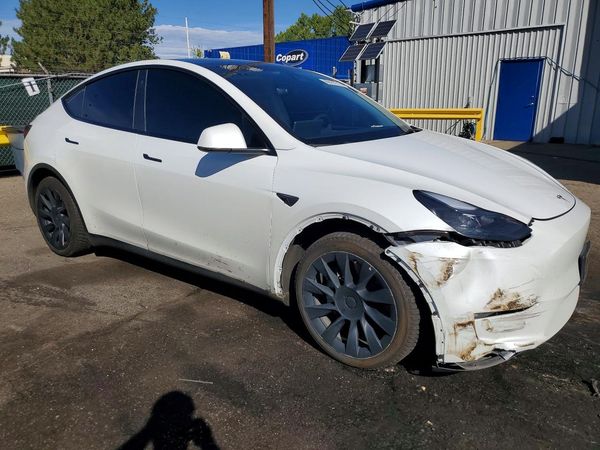 2023 TESLA MODEL Y — Passenger 3/4