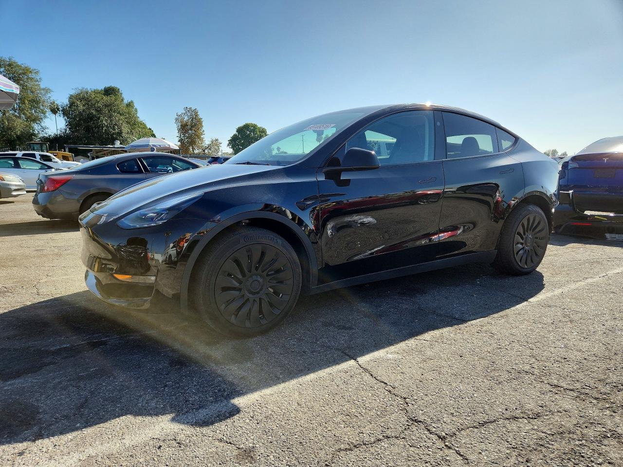 2023 TESLA MODEL Y — Front 3/4