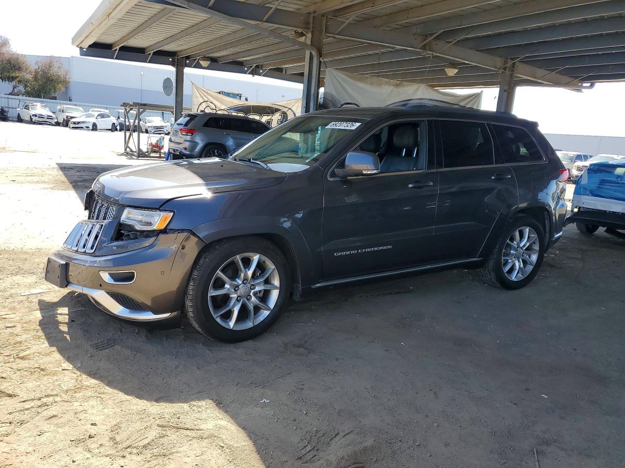 2015 JEEP GRAND CHEROKEE Summit — Front 3/4