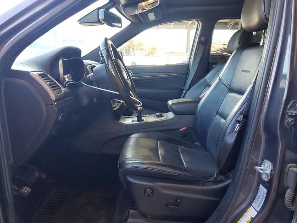 2015 JEEP GRAND CHEROKEE Summit — DENT