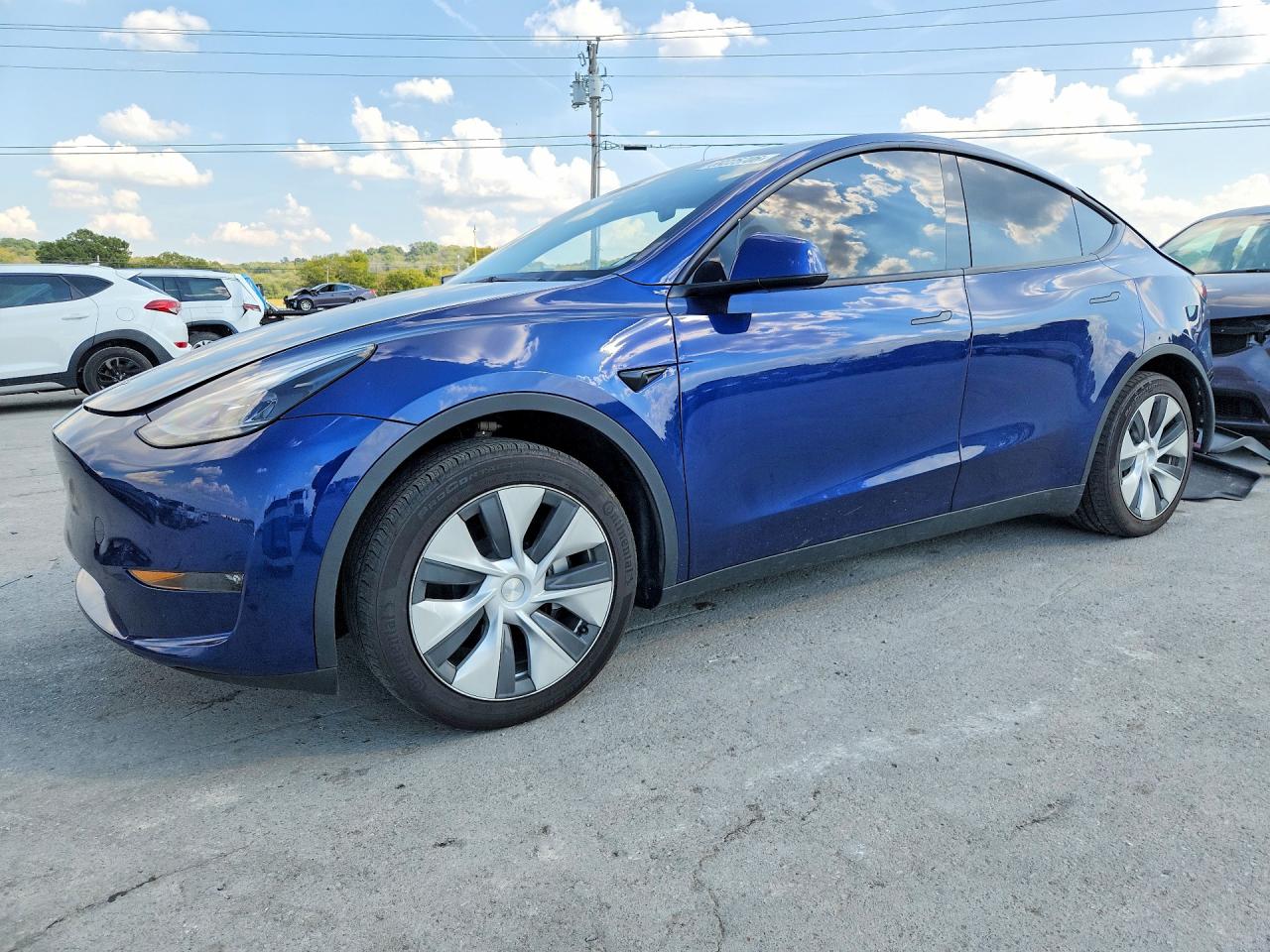 2023 TESLA MODEL Y — Front 3/4