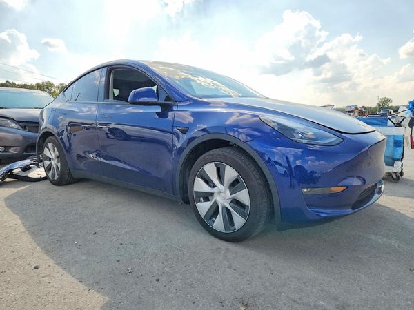 2023 TESLA MODEL Y — Passenger 3/4