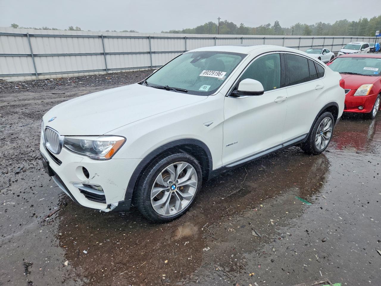 2015 BMW X4 xDrive35i — Front 3/4