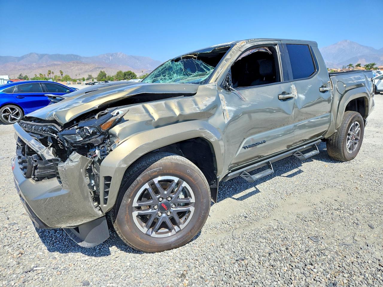 2024 TOYOTA TACOMA — Front 3/4