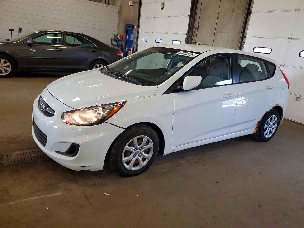 2014 HYUNDAI ACCENT 5DR GS / 4DR GLS — Front 3/4