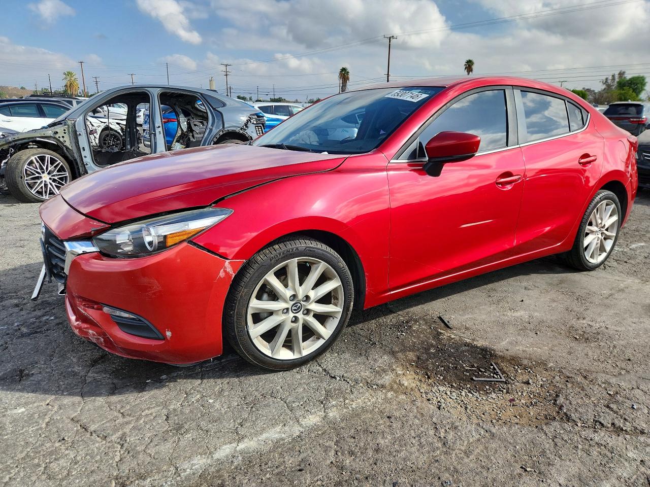 2017 MAZDA 3 — Front 3/4