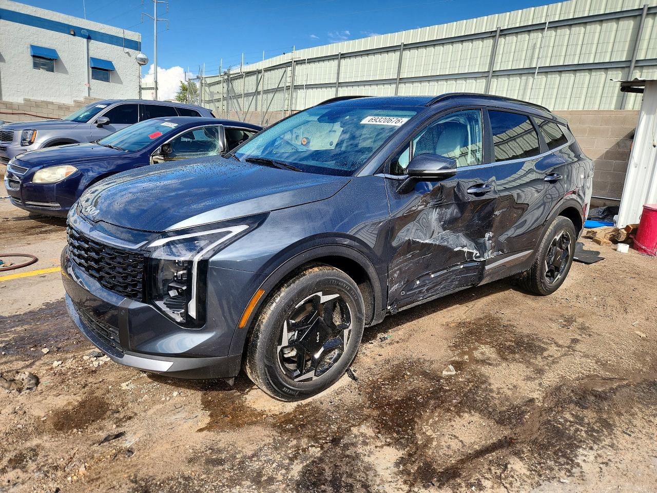 2026 KIA SPORTAGE HYBRID — Front 3/4