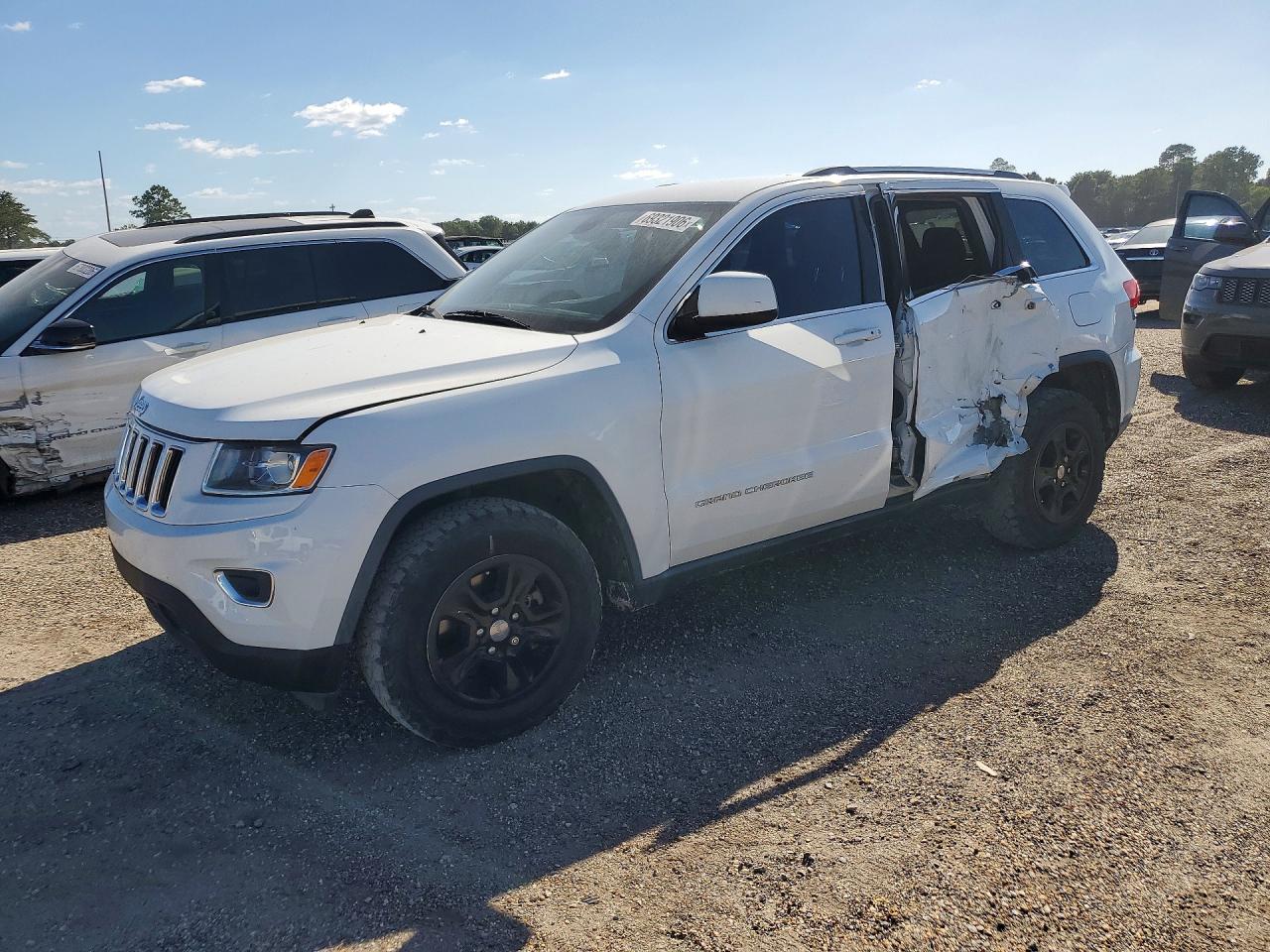 2015 JEEP GRAND CHEROKEE — Front 3/4