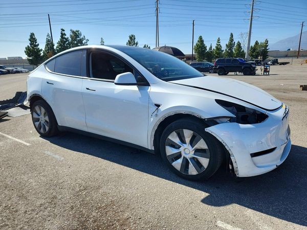 2022 TESLA MODEL Y — Passenger 3/4