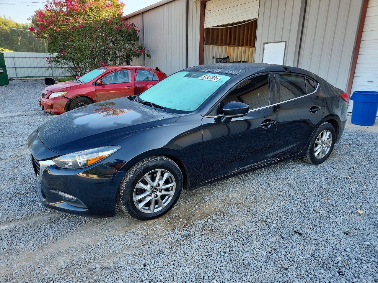 2017 MAZDA 3 — Front 3/4