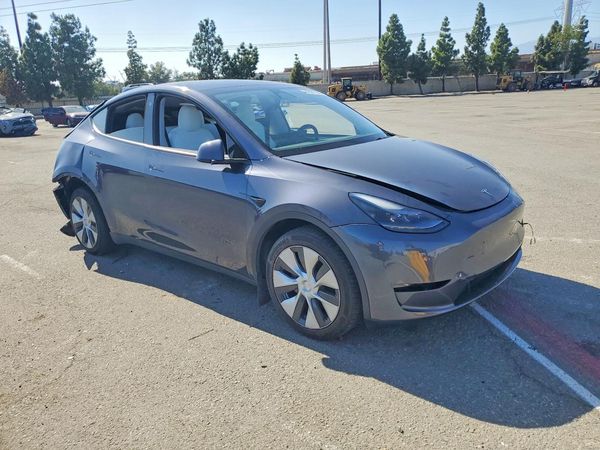 2023 TESLA MODEL Y — Passenger 3/4