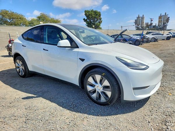 2023 TESLA MODEL Y — Passenger 3/4