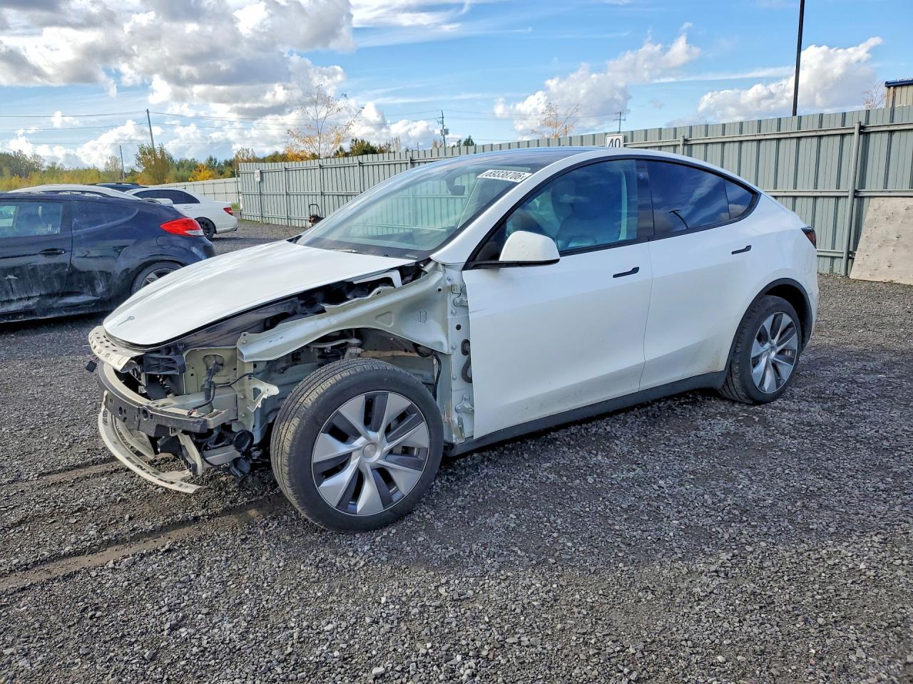 2023 TESLA MODEL Y — Front 3/4