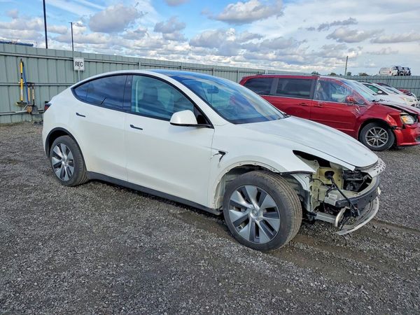 2023 TESLA MODEL Y — Passenger 3/4