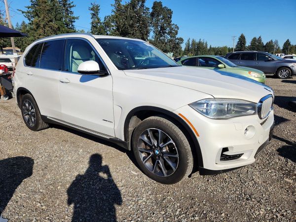 2014 BMW X5 — Passenger 3/4
