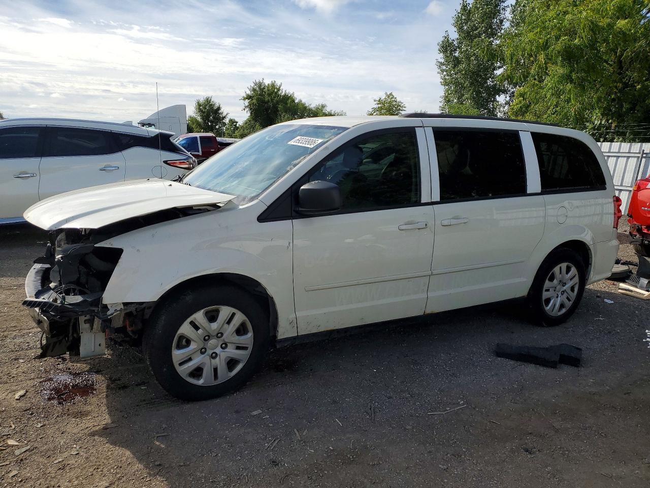 2013 DODGE GRAND CARAVAN SE — Front 3/4