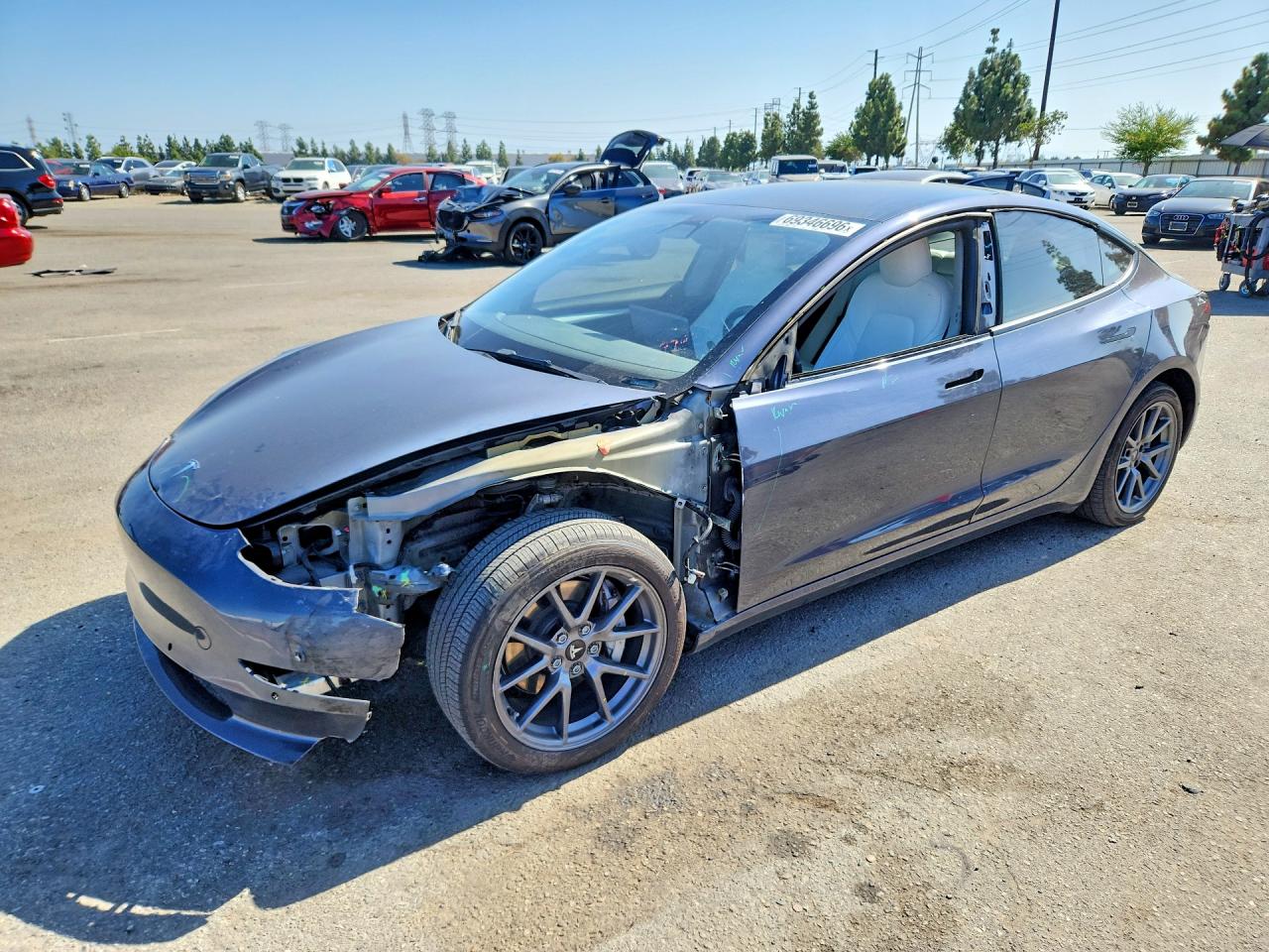 2022 TESLA MODEL 3 — Front 3/4