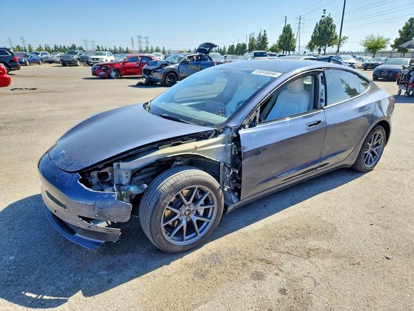 2022 TESLA MODEL 3 — Front 3/4