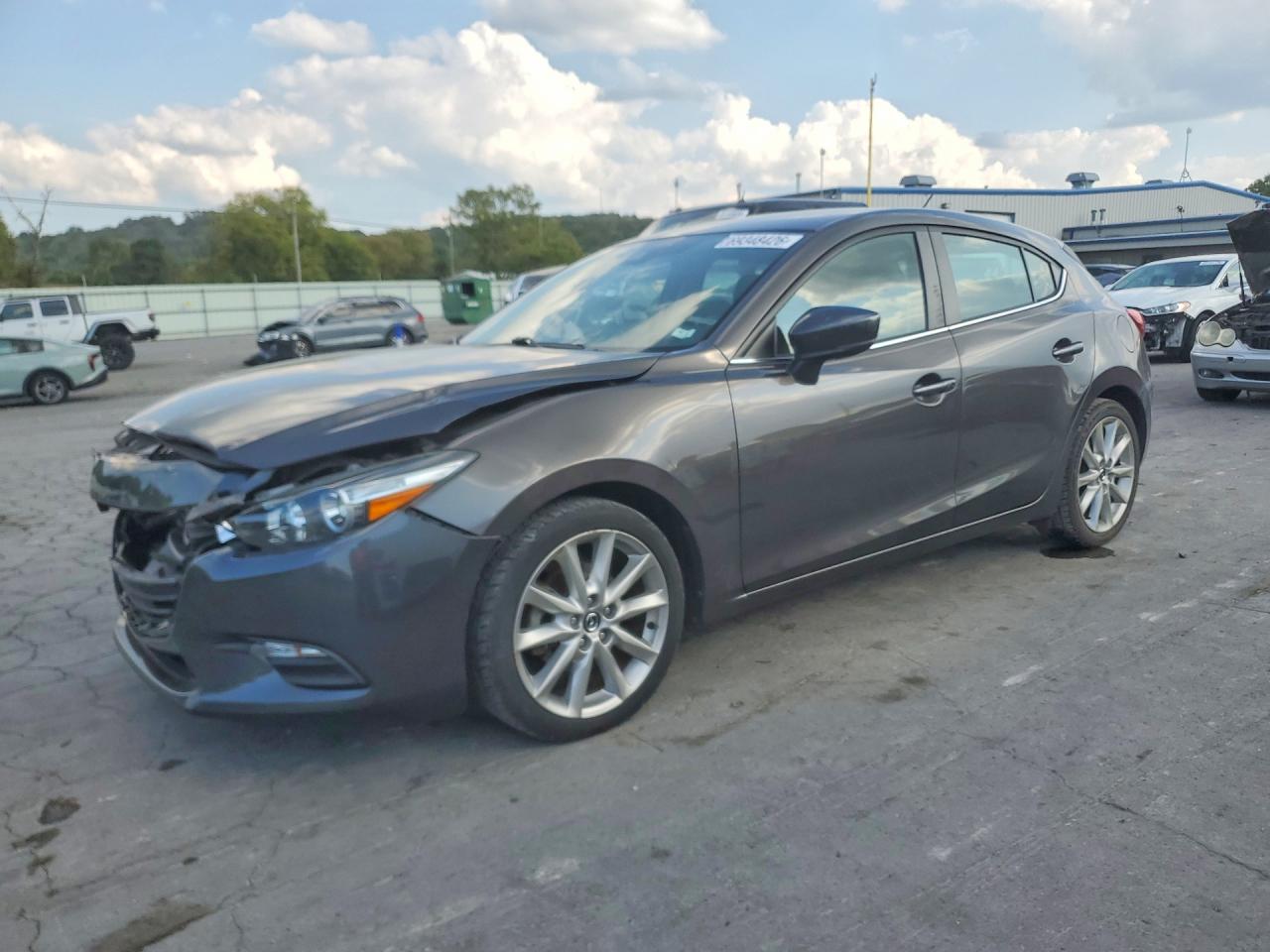 2017 MAZDA 3 — Front 3/4