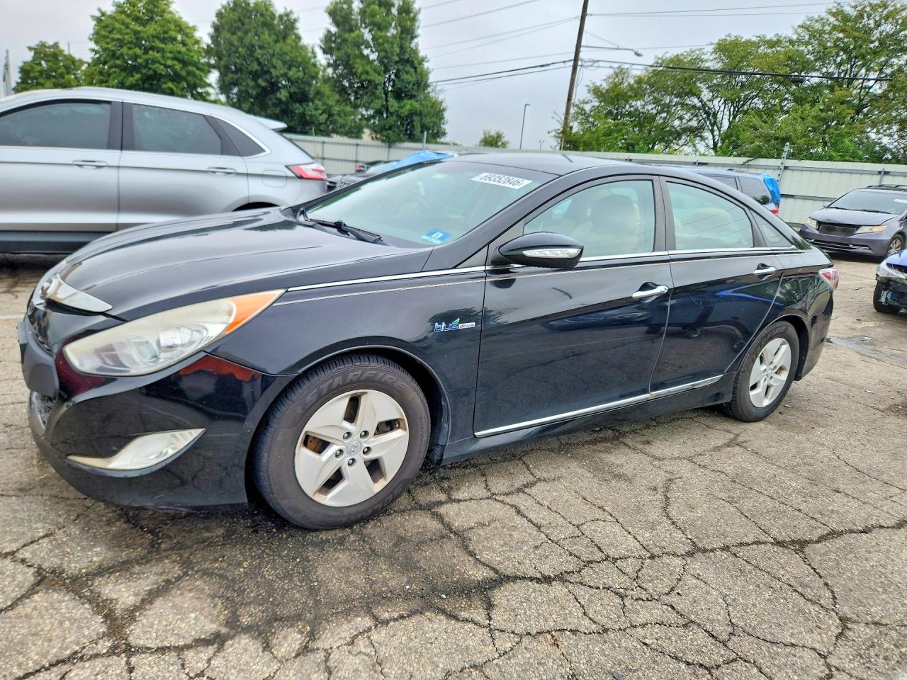 2012 HYUNDAI SONATA Middle level — Front 3/4