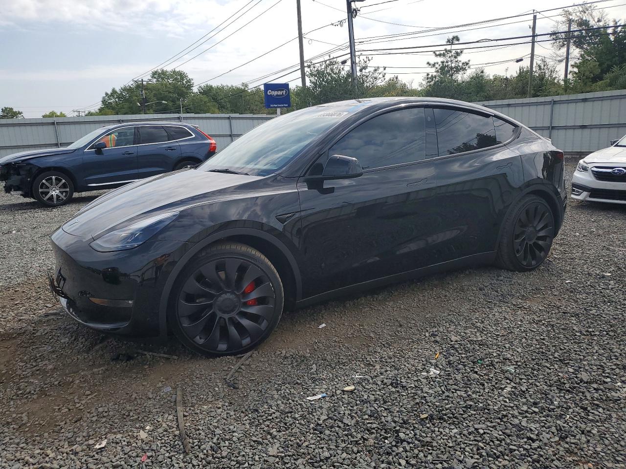 2023 TESLA MODEL Y — Front 3/4