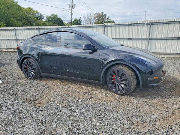 2023 TESLA MODEL Y — Passenger 3/4