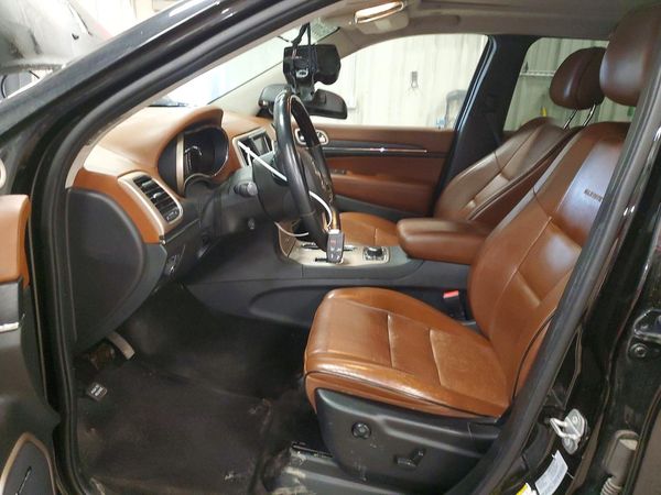 2015 JEEP GRAND CHEROKEE Summit — DENT
