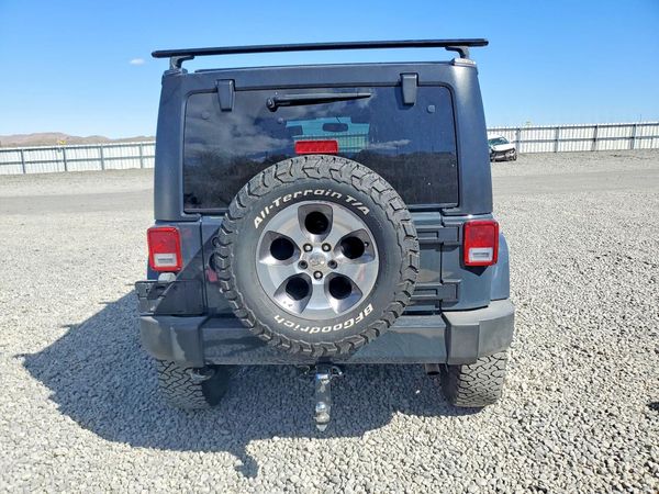 2016 JEEP WRANGLER UNLIMITED Sahara — DIRR
