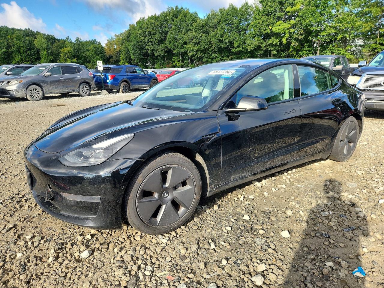 2021 TESLA MODEL 3 — Front 3/4